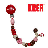 Krea pacifier holder  in wood with hearts, red